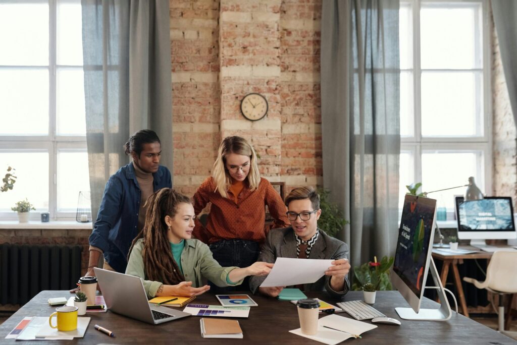 A direct marketing team in 2025 making plans together