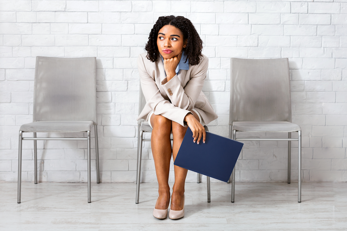A young woman waiting for the decision on her Supreme Concepts job application